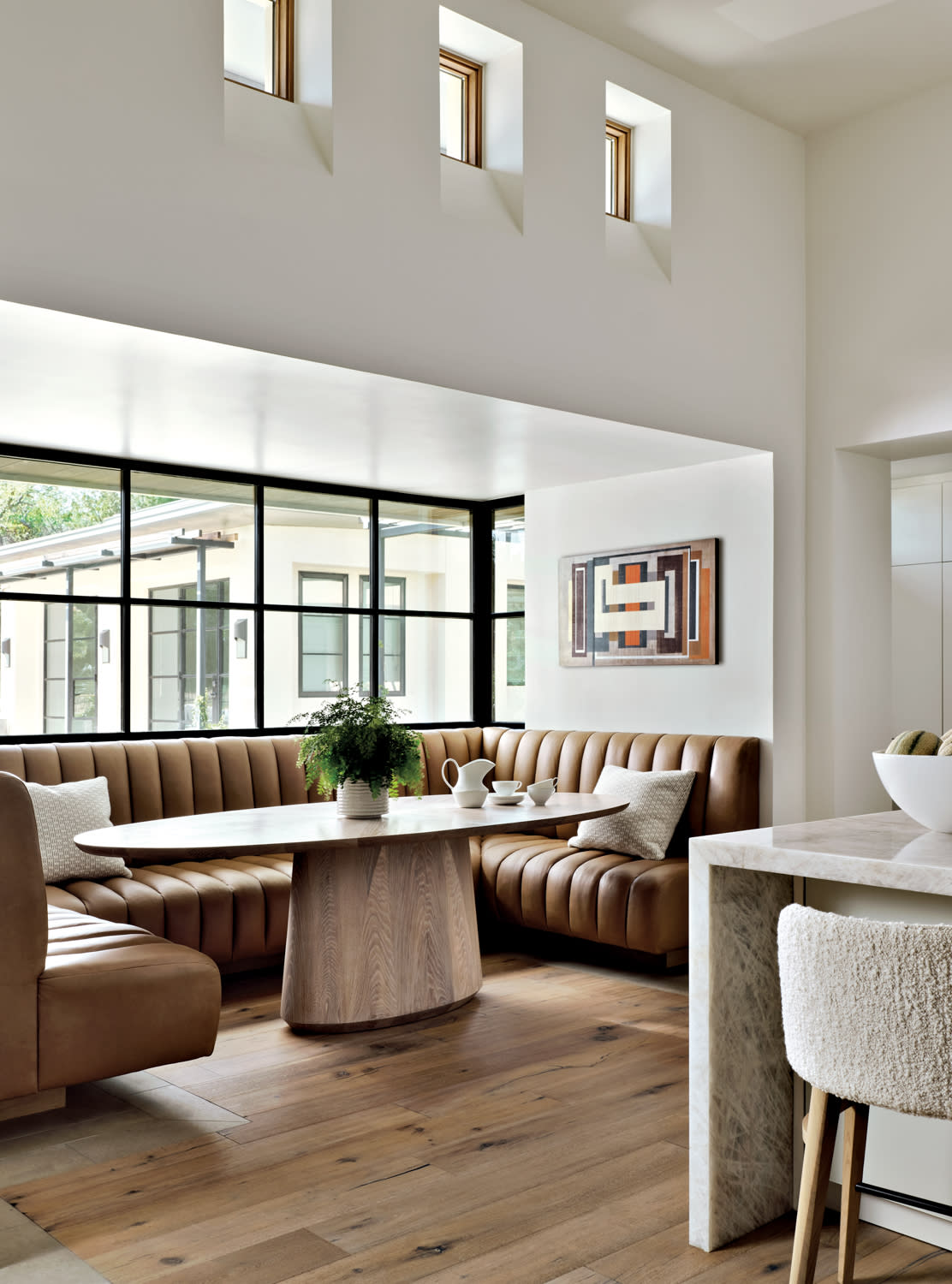 Breakfast nook with plush leather banquette
